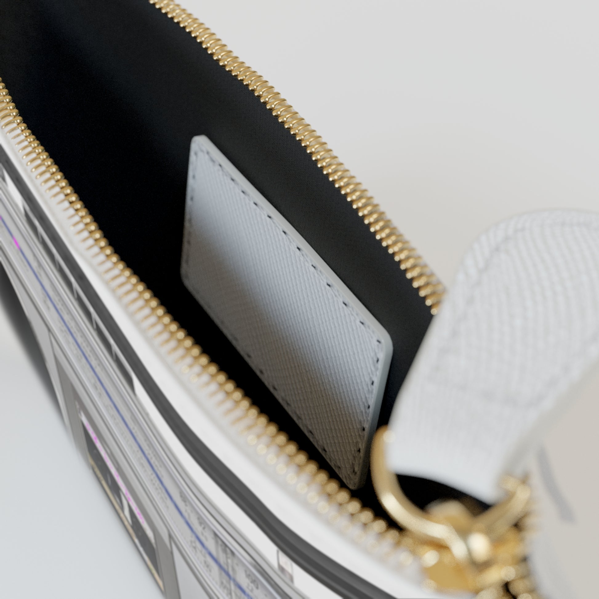 Close-up of a No Other Lover mini boombox clutch wallet with gold zipper and black interior