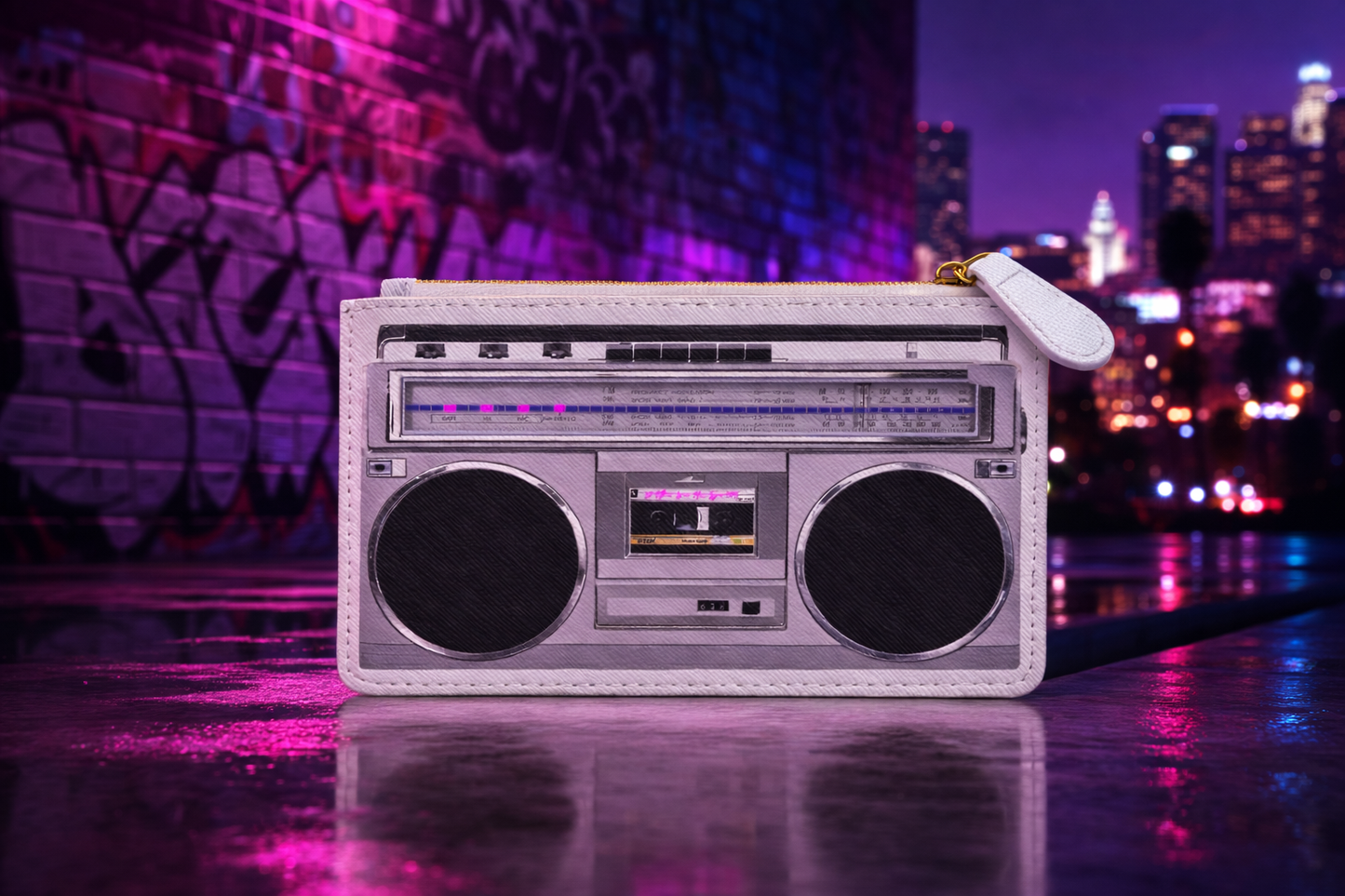 Vintage-style No Other Lover boombox mini clutch bag with ghetto blaster design and cityscape and graffiti in the background